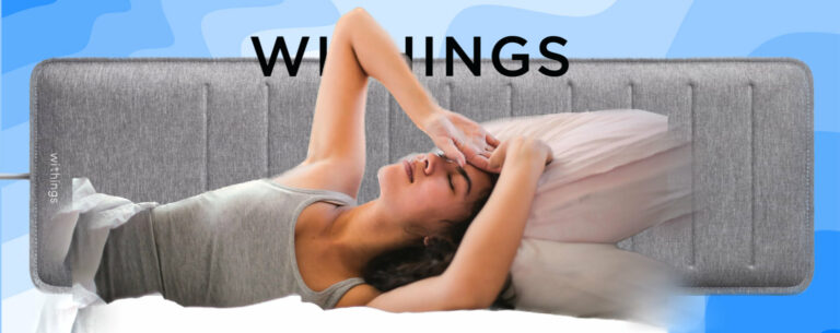 woman sleeping with withings sleep tracking mat in background and withings logo behind. Image clicks through to review of withings sleep tracking mat